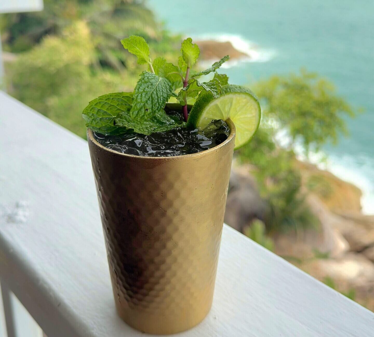 Sunset cocktail at an ocean-view bar in Koh Samui at Malabar India
